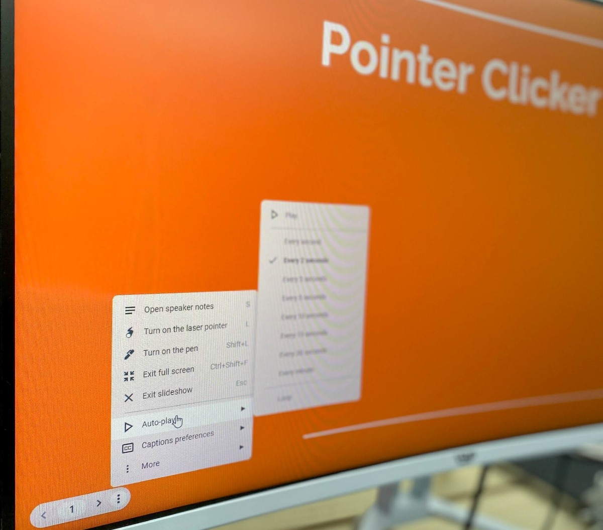 click the Auto-play icon on Google Slides showing on a monitor