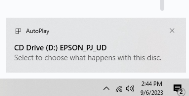 CD Drive EPSON display driver notification on a laptop screen