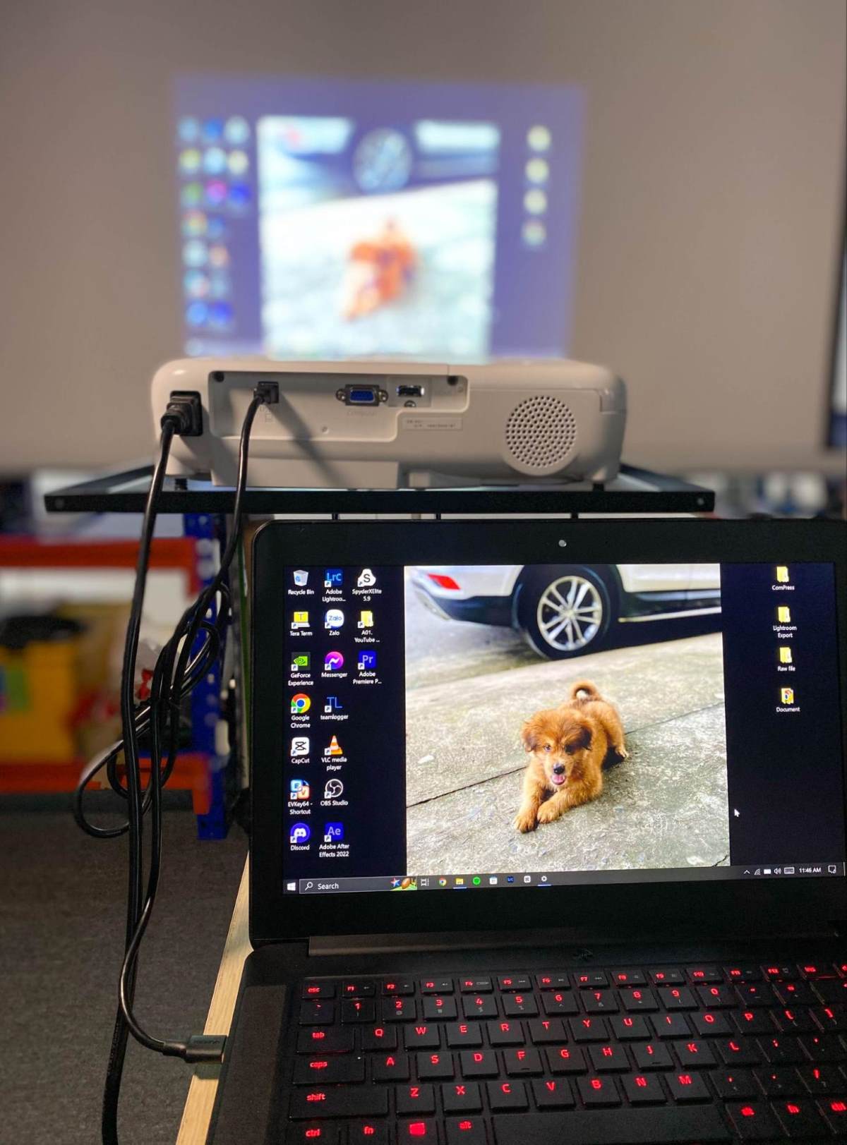 a Laptop connected to an Epson projector via a USB cable