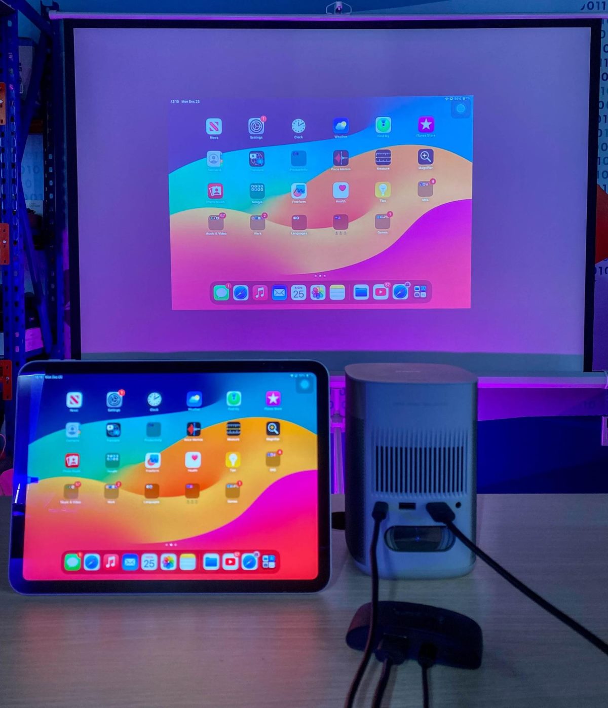 an iPad screen is mirroring wirelessly with an XGIMI projector