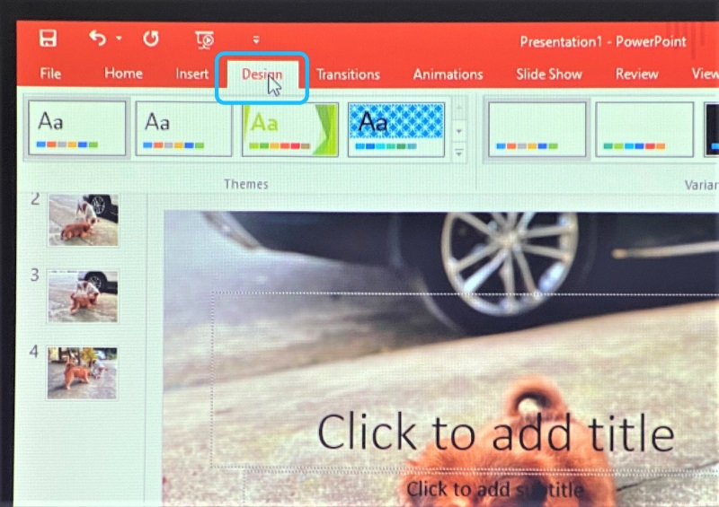 select Design settings on the PowerPoint ribbon menu