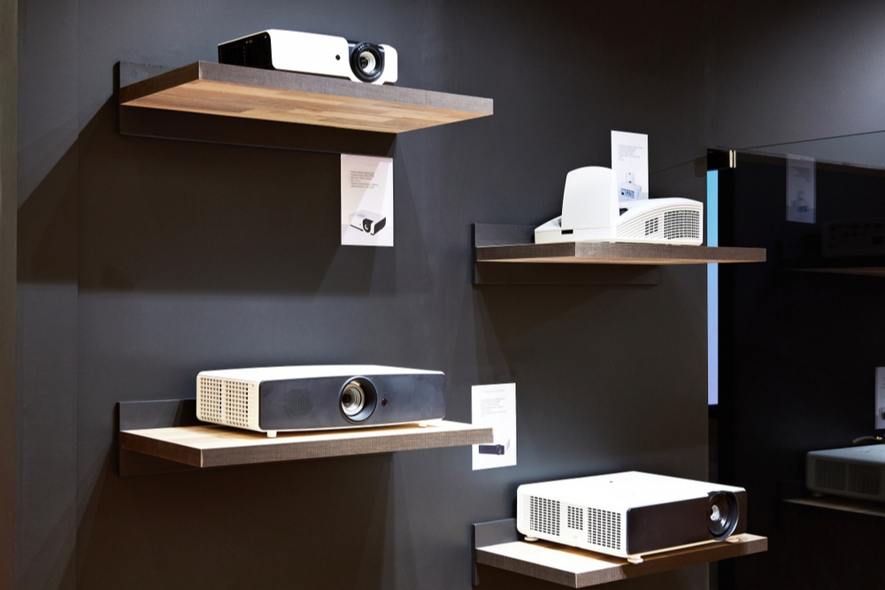 projectors on wall-mounted shelves