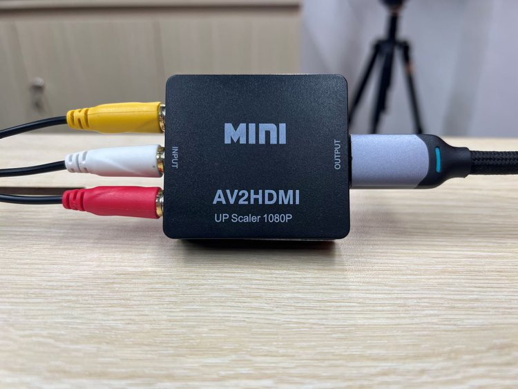 AV to HDMI adapter with the AV cable and HDMI are cable connected