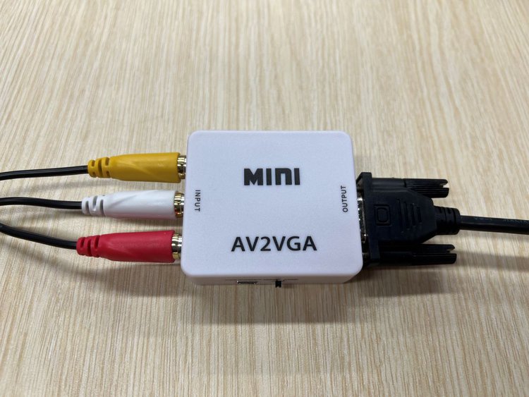 AV to RVA adapter with the AV cable and RCA cable are connected