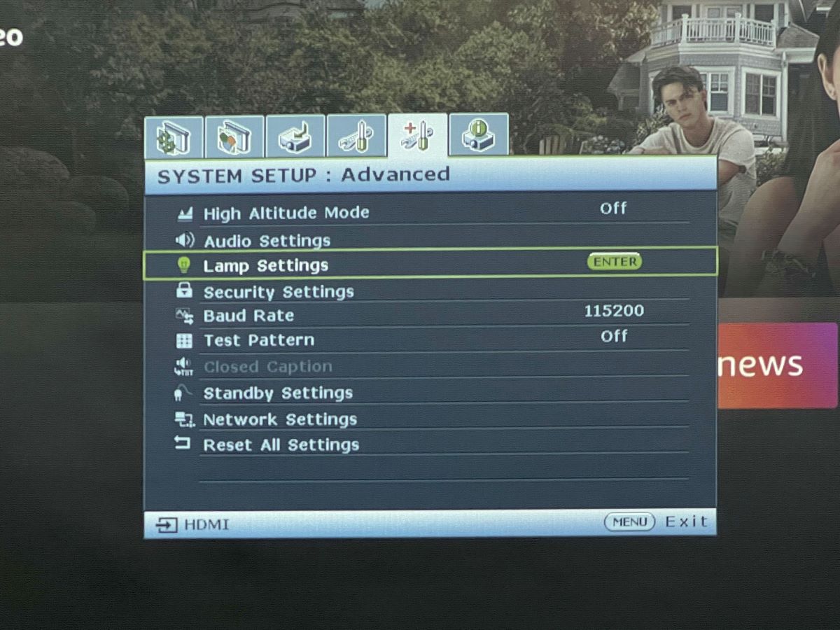 lamp settings option is highglighted on a benq projector