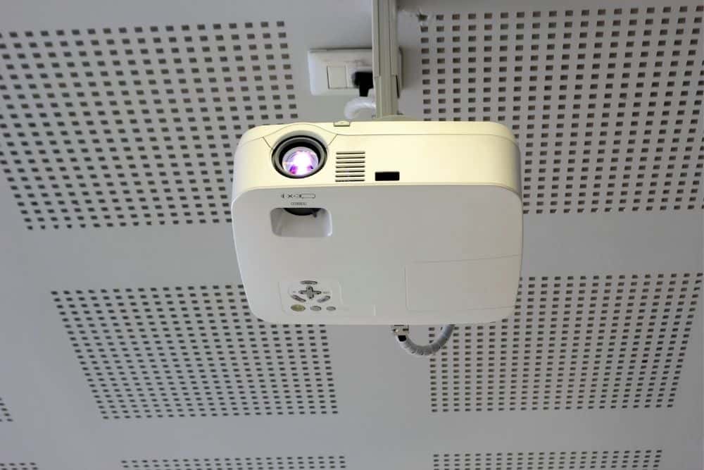 projector mounted upside down from the ceiling