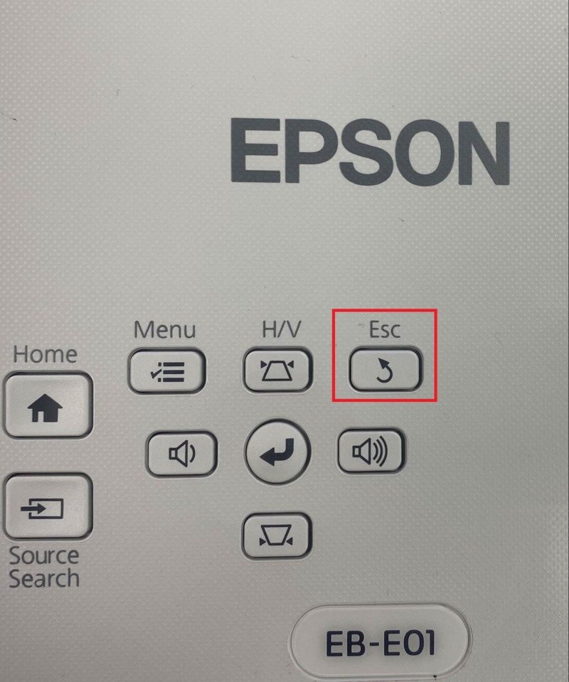 select the Esc button on the Epson projector control panel