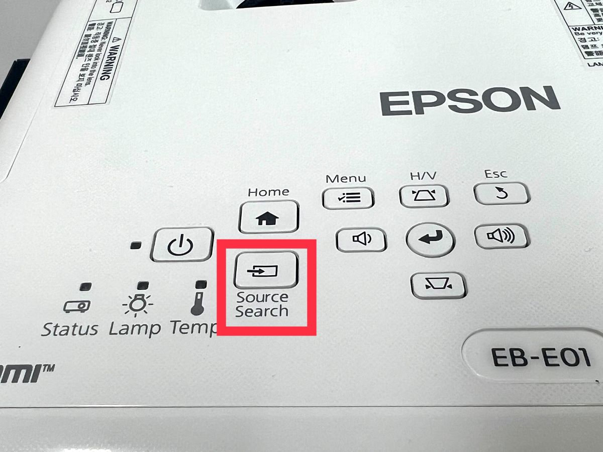source search button on an epson projector is highlighted