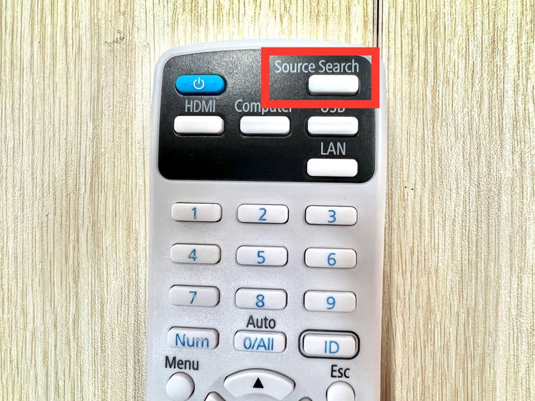 source search button on an epson projector's remote