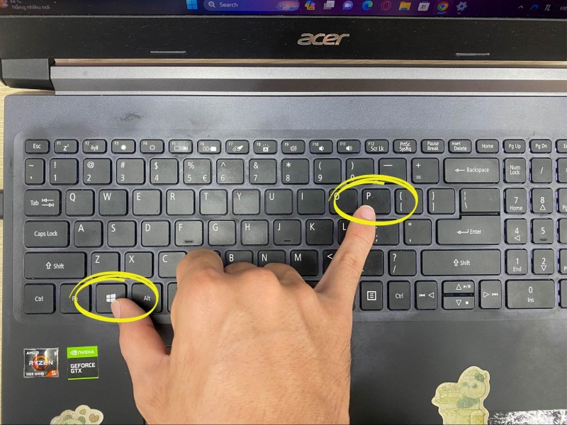 press the Windows and P keys at the same time on the Windows laptop keyboard