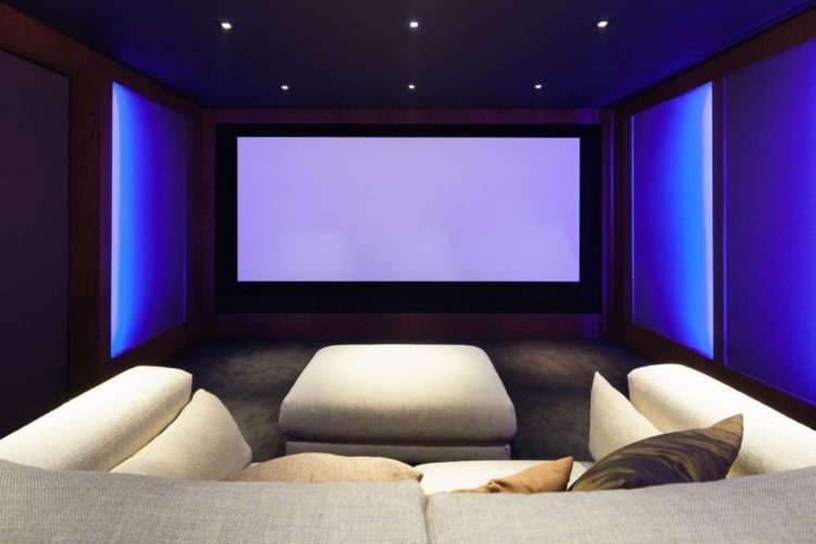 a home theater with big screen size