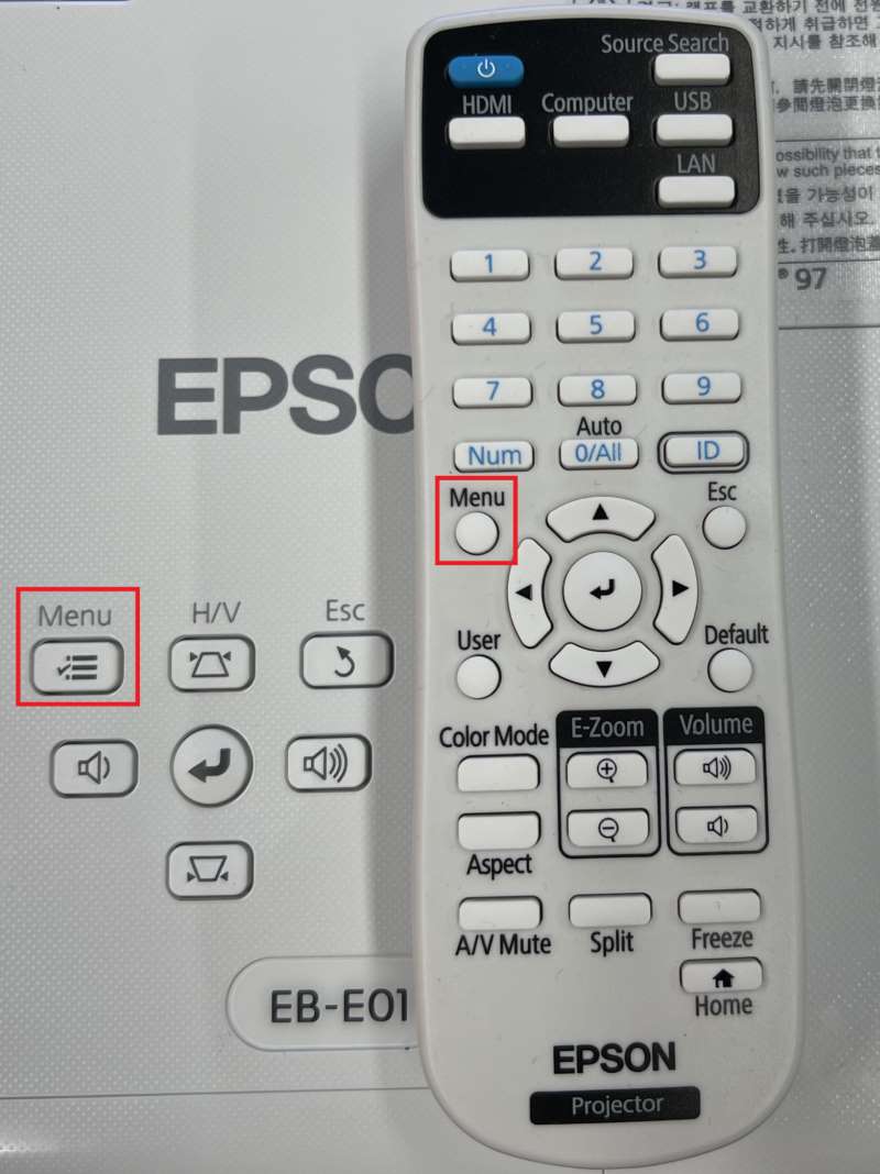press the Menu buttons on an Epson projector remote and control panel