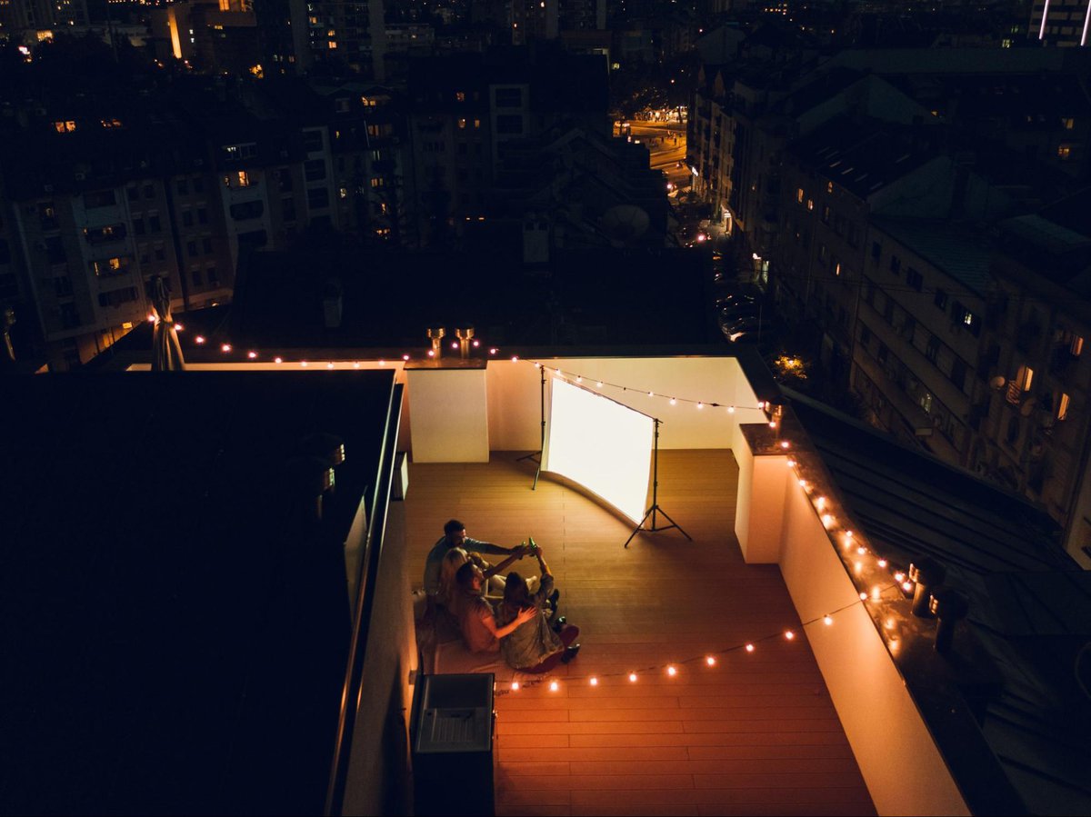 projector movie night on a rooftop