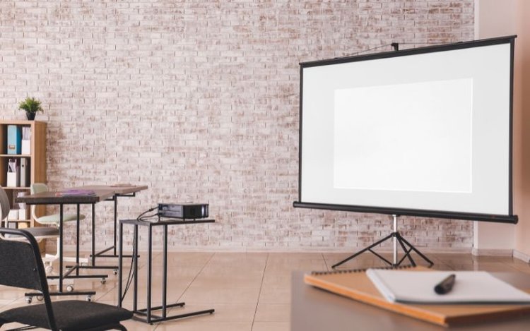 projector screen being used in a room