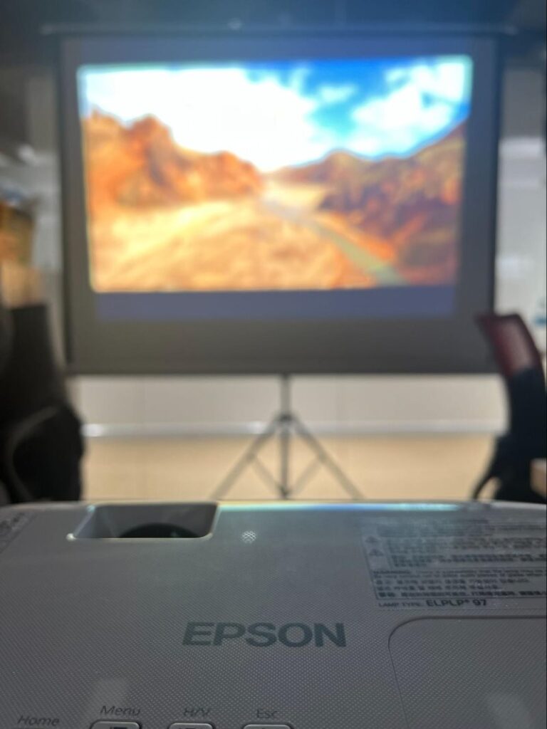 Epson projector's blurry image when put too far from the projection screen