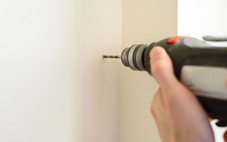 Drilling a Hole Through the Wall