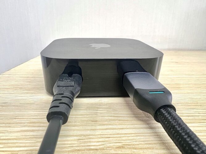 apple tv with hdmi and power cables plugged in