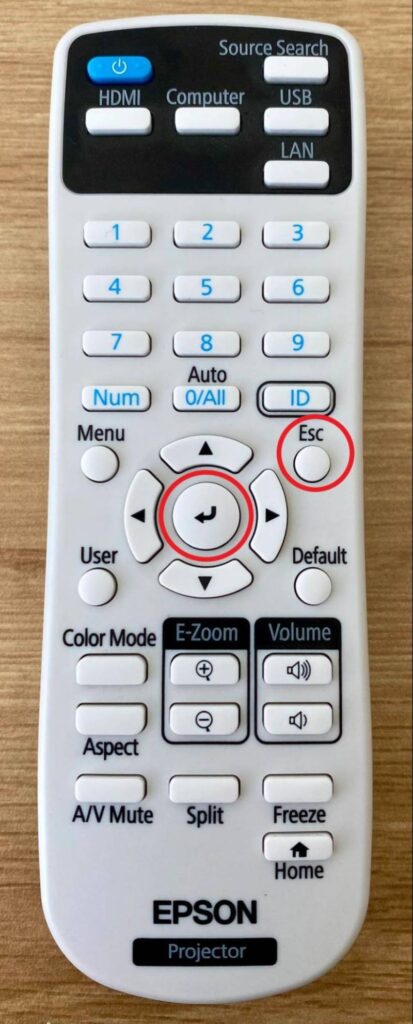 highlighted Esc and Enter buttons on the Epson projector remote