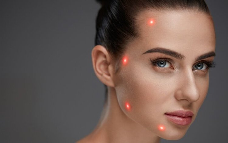 laser beam on a woman face