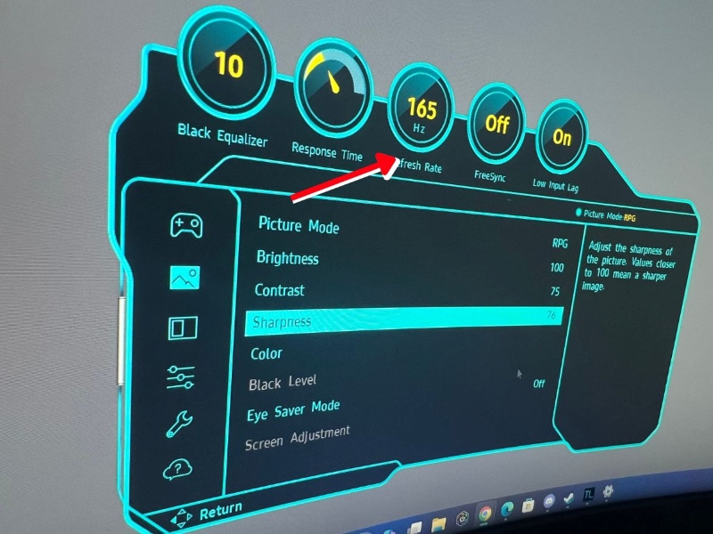 165Hz refresh rate is shown in a gaming monitor OSD