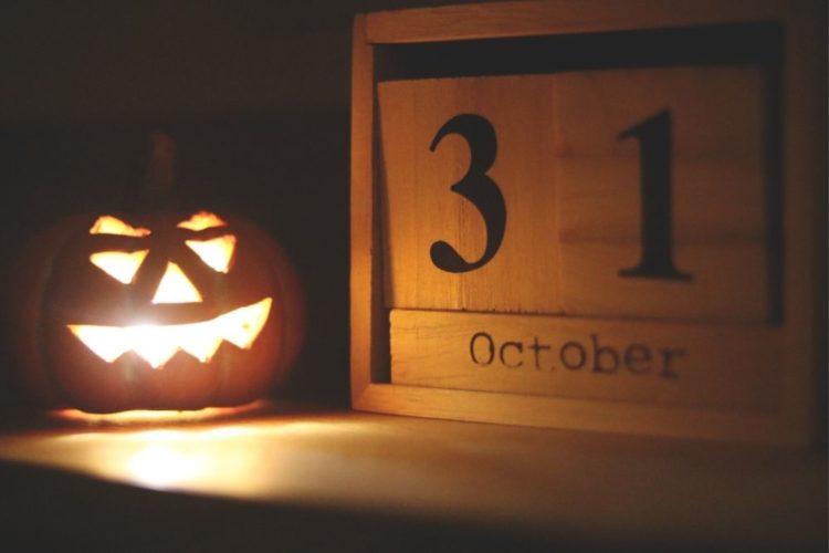A jack-o-lantern and a wooden calender