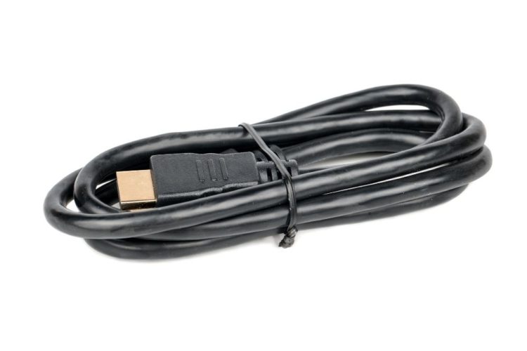 A long black HDMI cable is tied