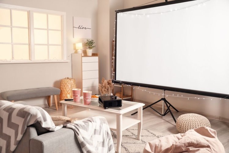 A projector screen in a cozy room