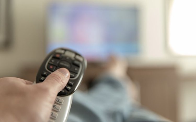 Adjusting hotel tv with a remote