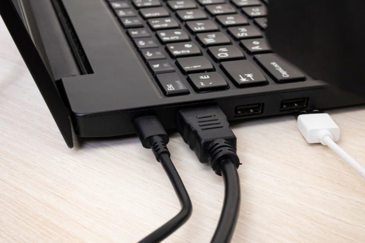 Variety of ports of a black laptop