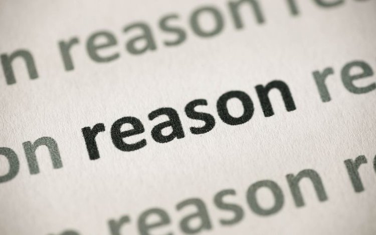 Word reason printed on paper