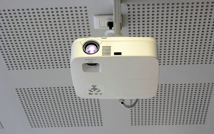 a ceiling-mounted projector