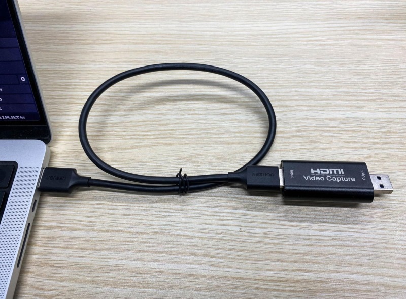 a video capture card is connecred to a HDMI port on a laptop