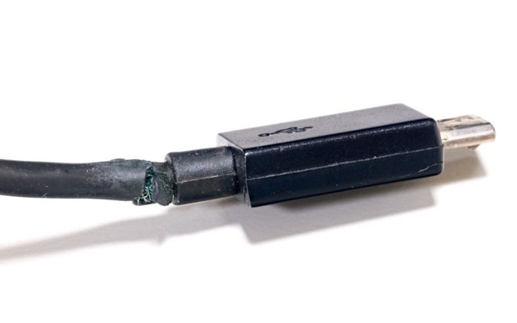 a worn, broken cable