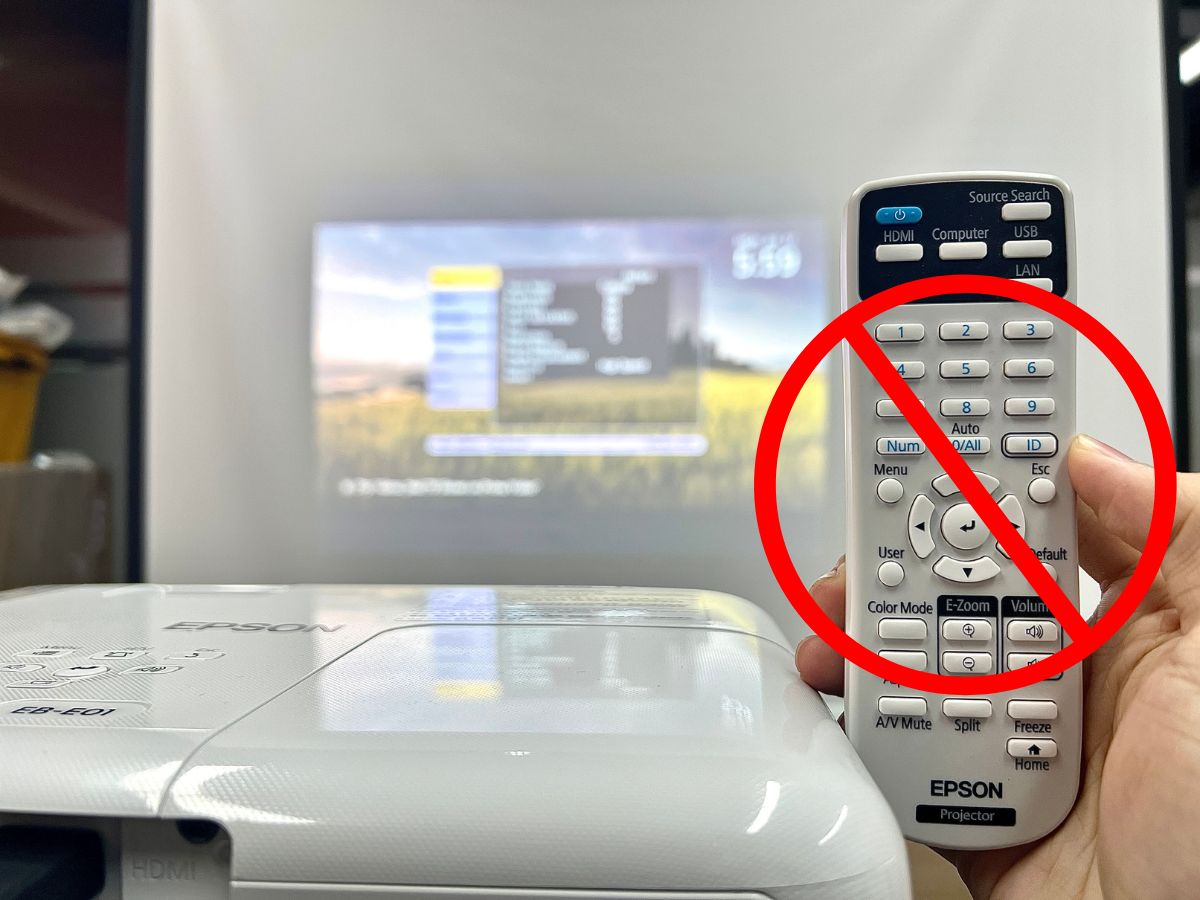 banned icon on the epson remote next to an epson projector