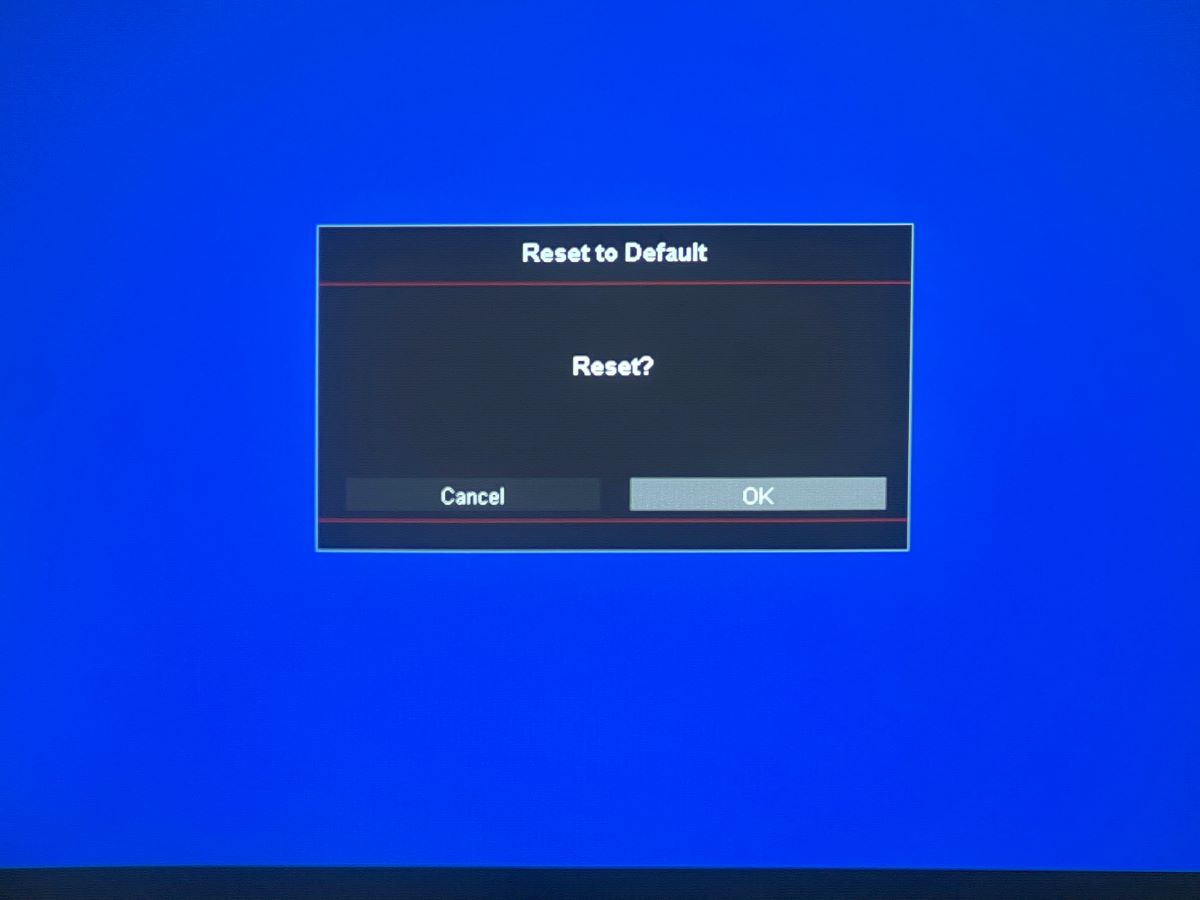 confirm to reset to default on an optoma projector