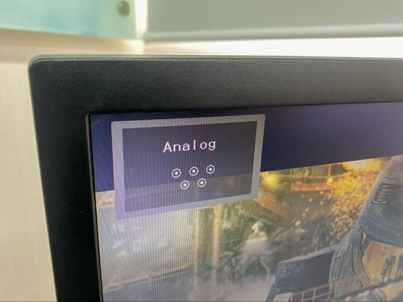 select the Analog (VGA) source option on a monitor