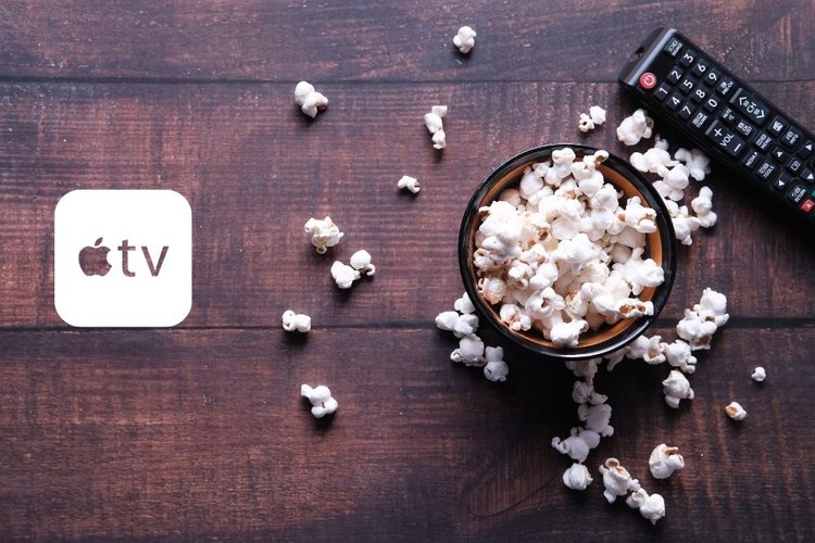 A bowl of popcorn with an apple tv logo