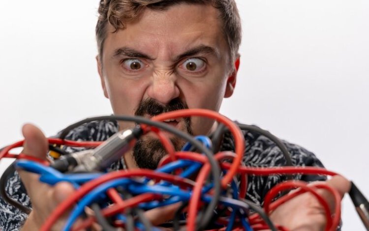Angry man with cables
