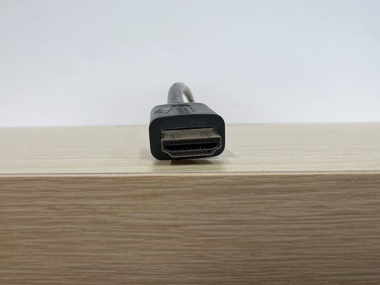 HDMI cable on a wooden table
