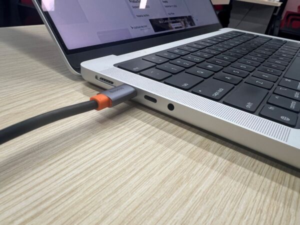The USB-C hub is plugged to the USB-C port on MacBook