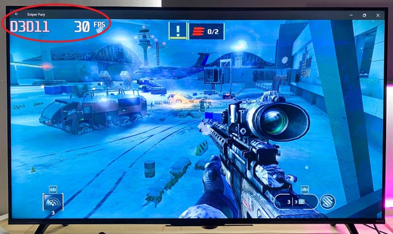 highlighting a 30 FPS game playing on a TV