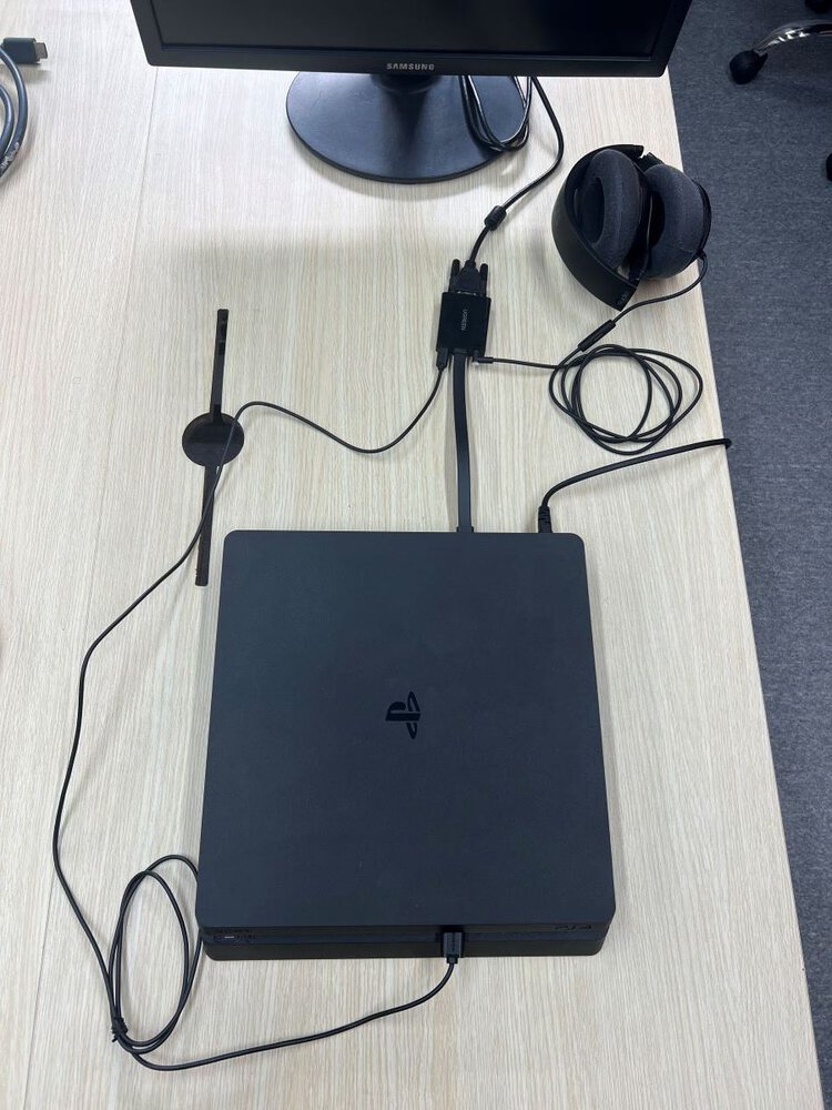 The final result of connecting PS4 console to VGA monitor and beats headphones to HDMI to VGA adapter