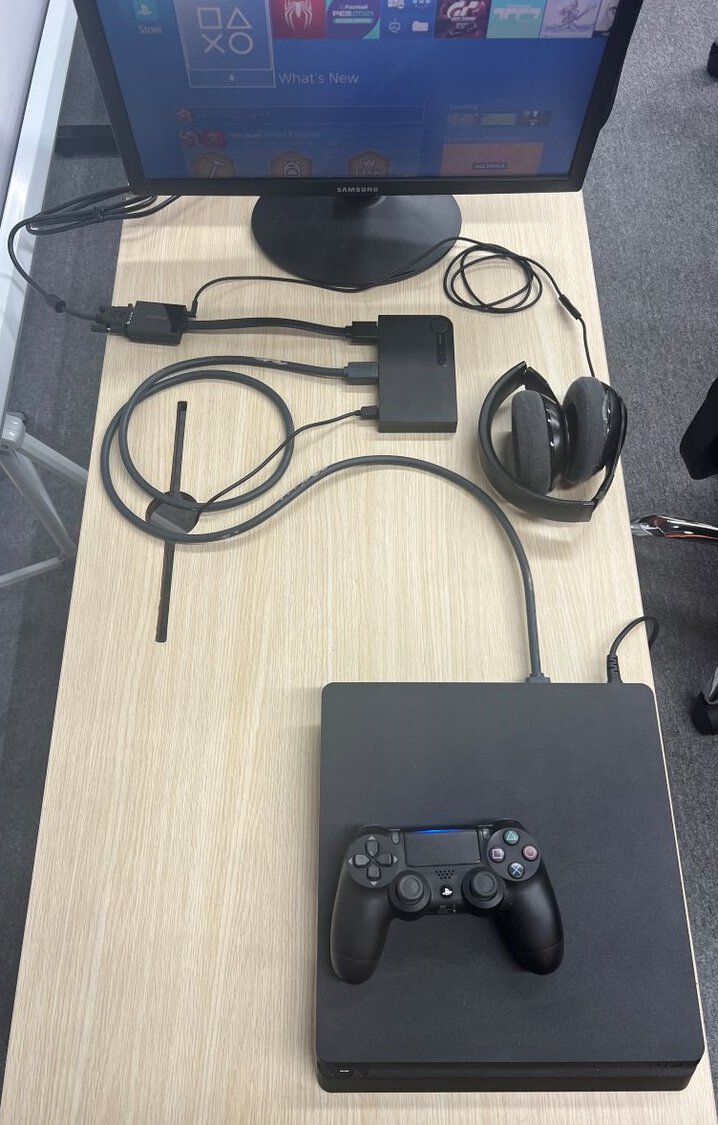 final result of connecting PS4 console to HDMI switch via HDMI to VGA adapter with beats headphones