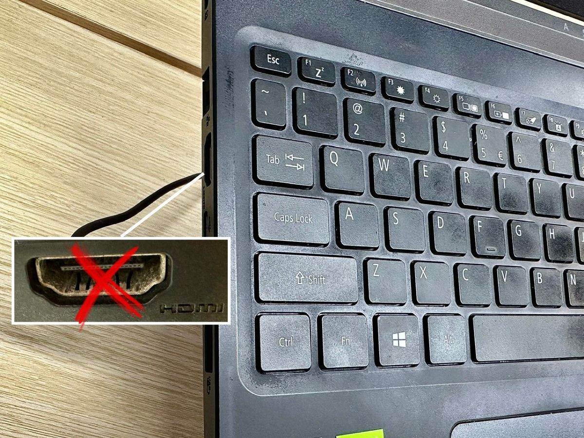 picture showing that the hdmi port of a laptop is broken