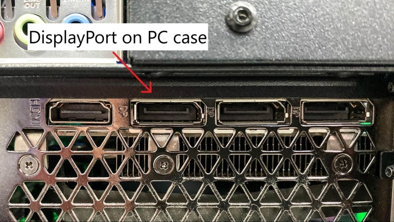 pointing to the DP port on the PC case