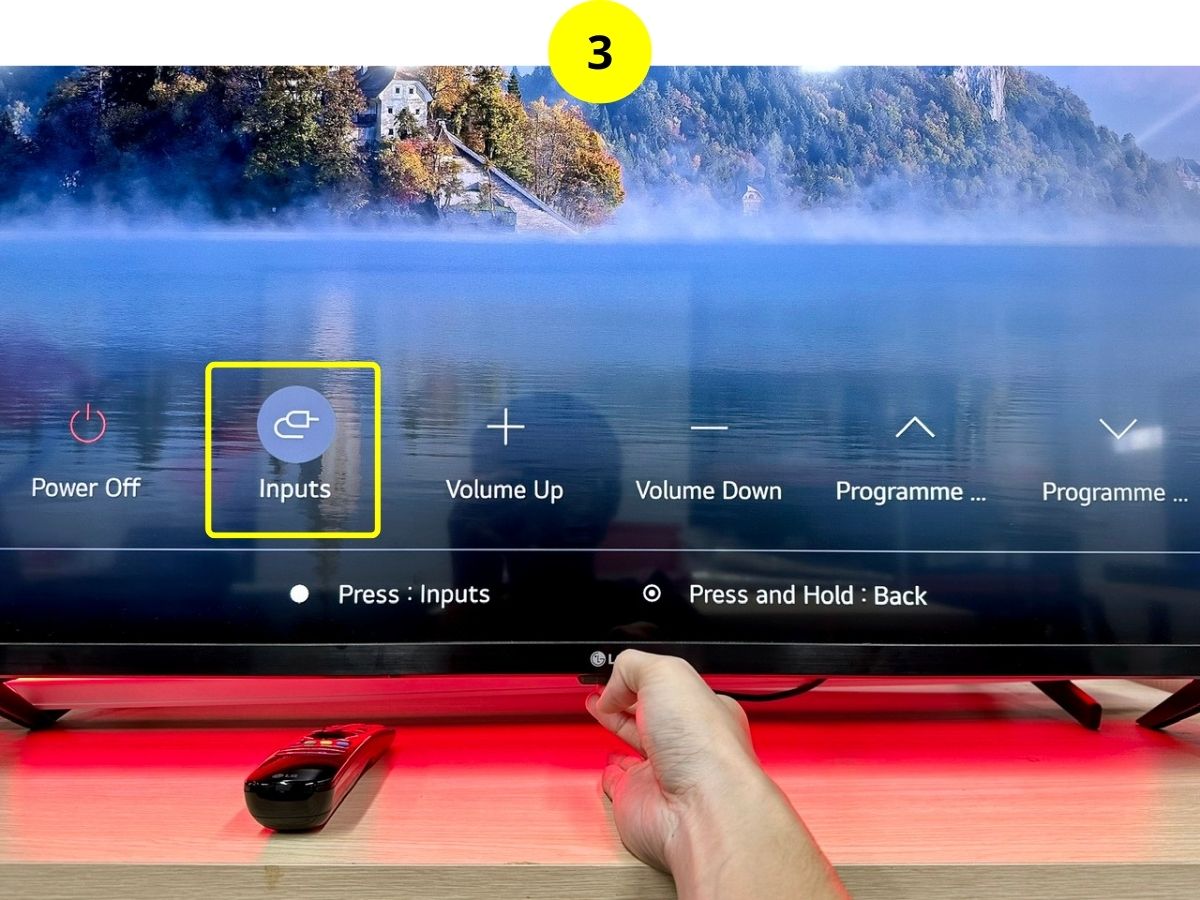 step 3 - long-press the power button when at the input option to choose it on an lg tv