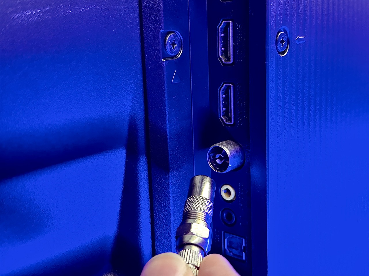 unplugging coaxial cable from a tv