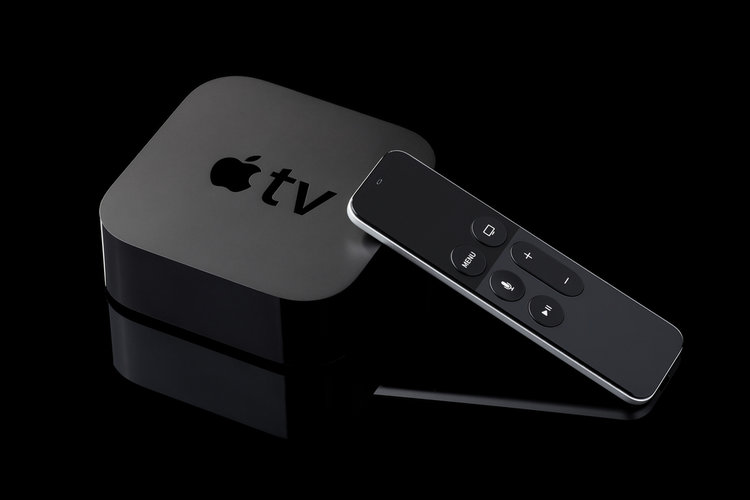 Apple TV box, remote and speaker