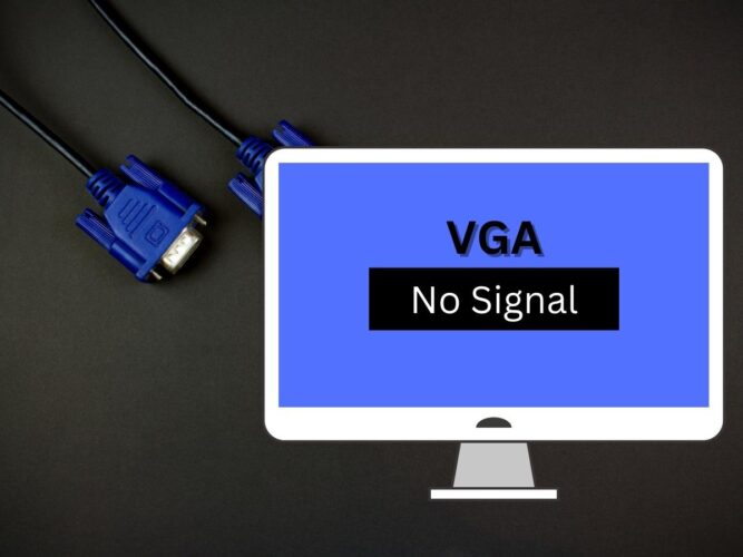 VGA no signal text on a monitor with vga cables in the background