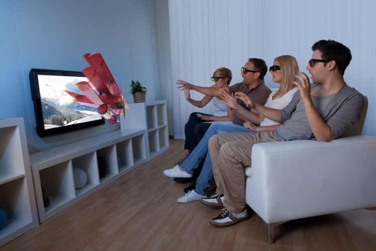 A group of friend watching 3D TV